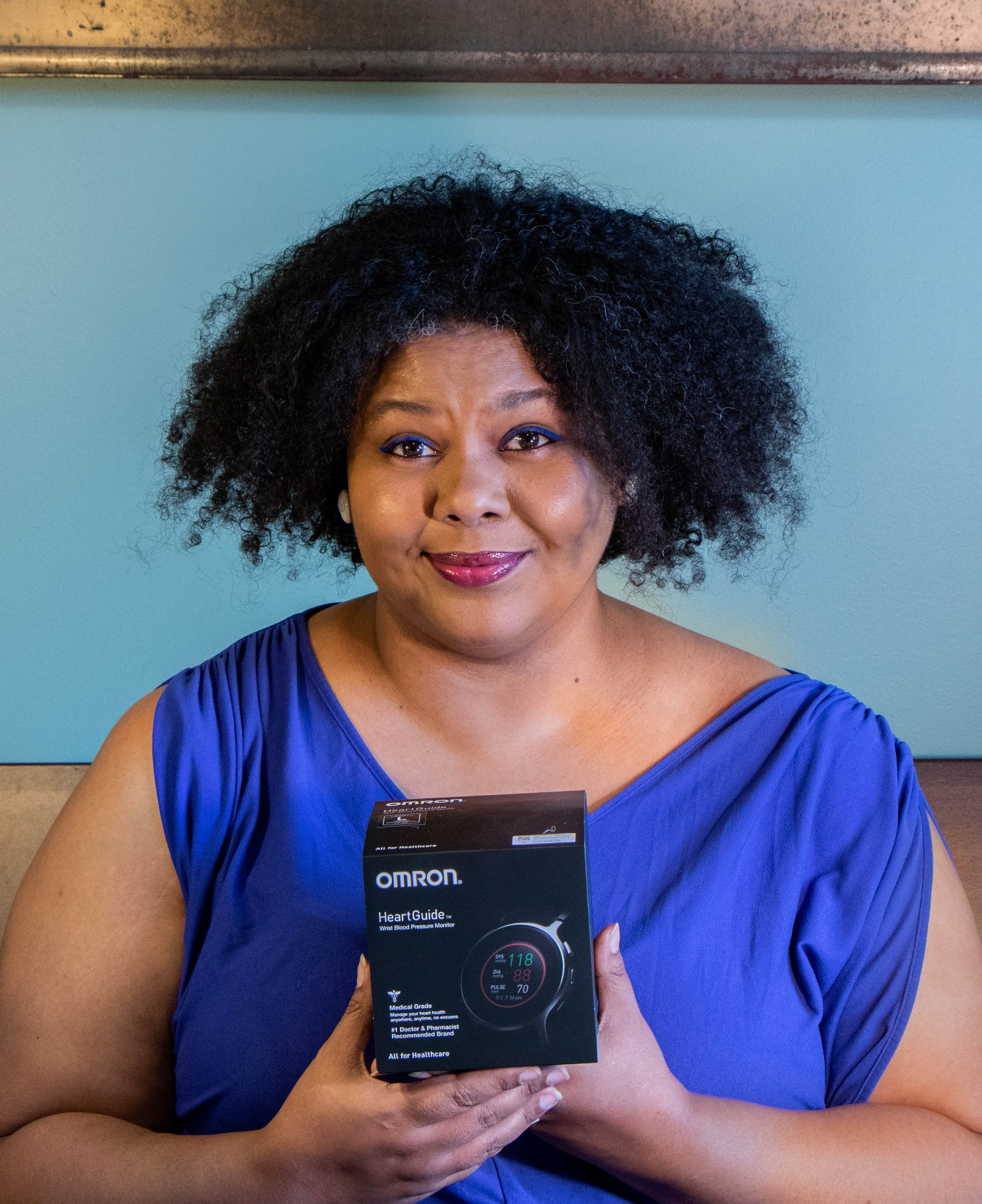 A person holding a camera
Description automatically generated with medium confidence