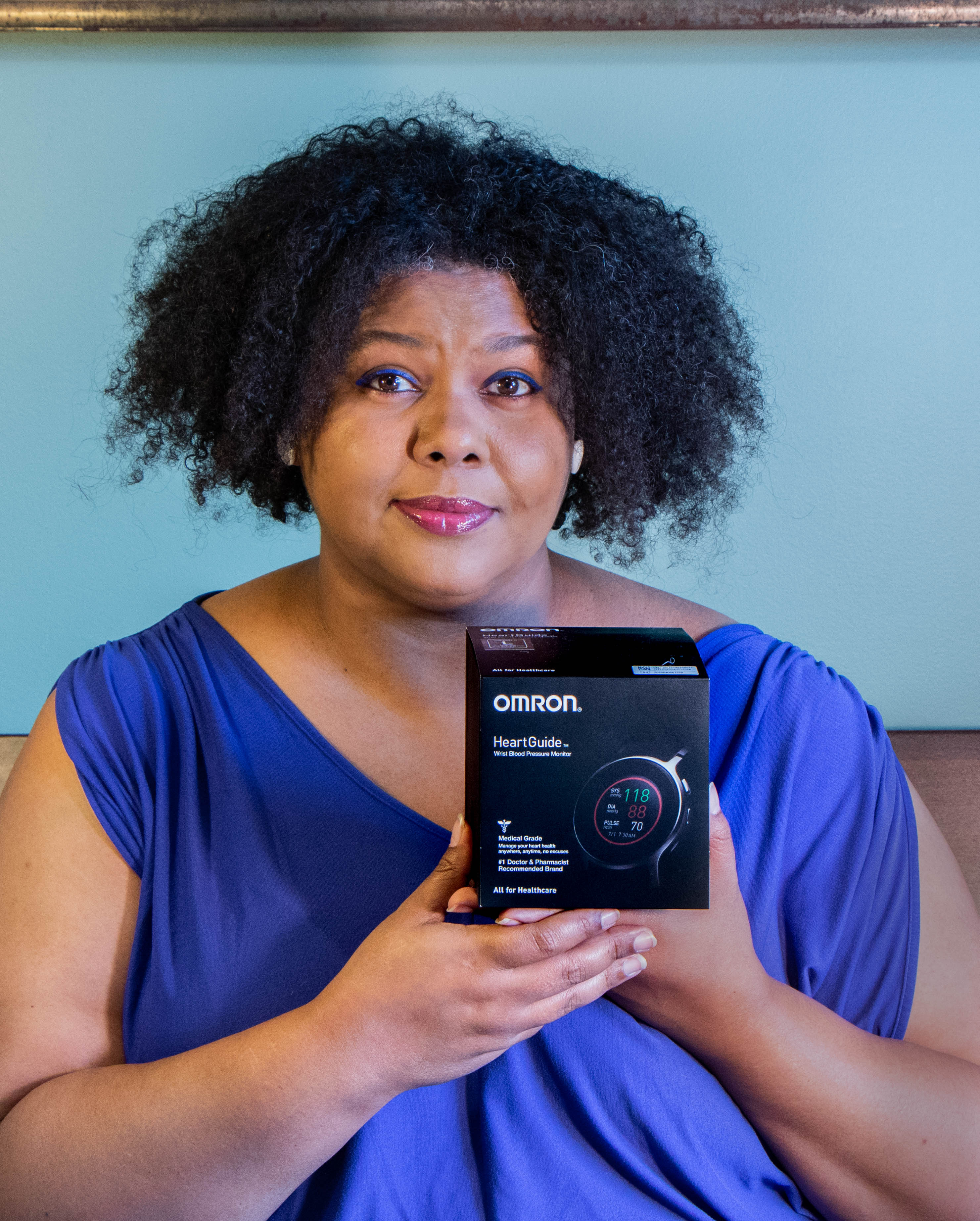 A person holding a camera
Description automatically generated with medium confidence